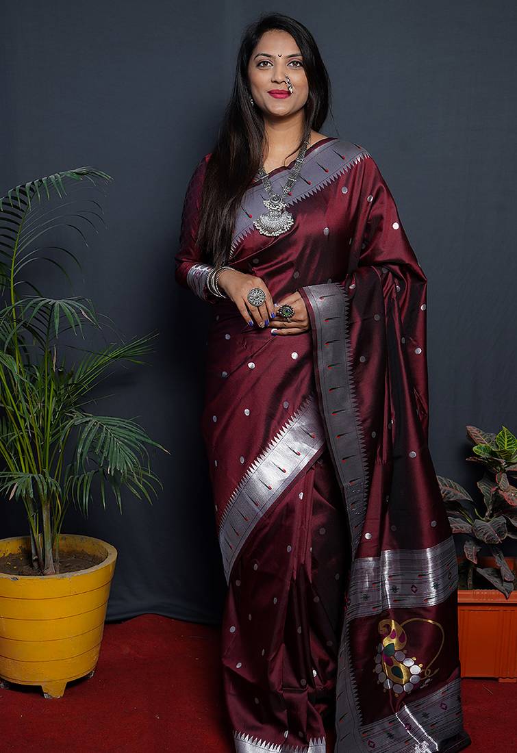 Maroon paithani silk blend saree with silver zari border