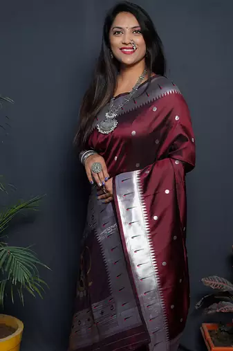 Maroon paithani silk blend saree with silver zari border