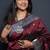 Maroon paithani silk blend saree with silver zari border