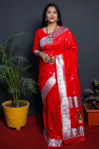 Red paithani silk blend saree with silver zari border