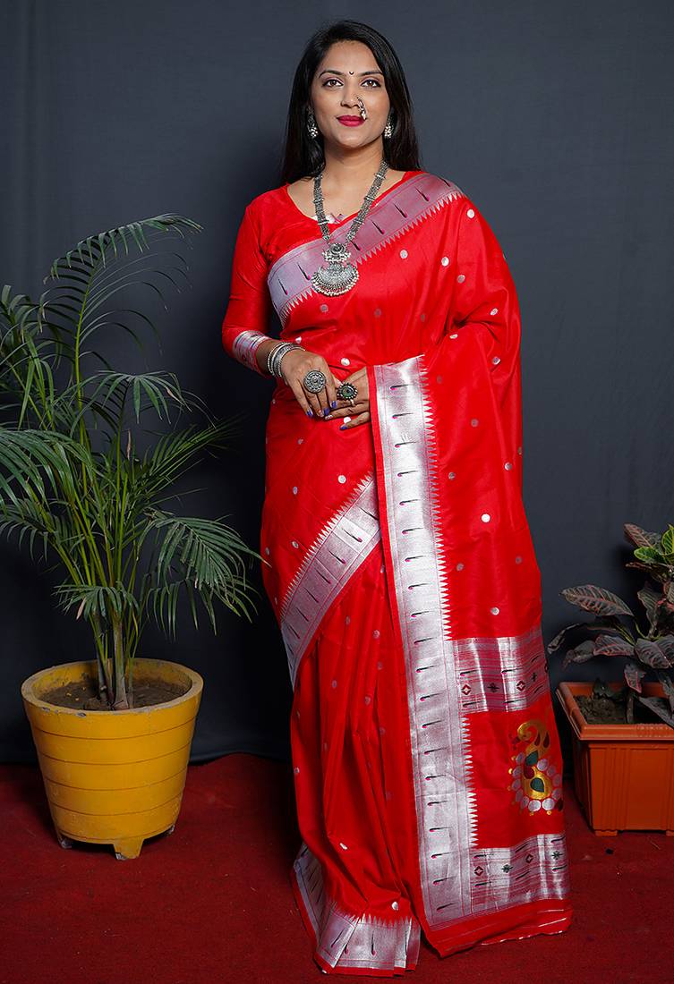 Red paithani silk blend saree with silver zari border