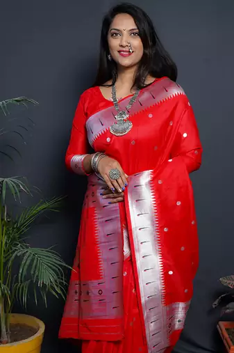 Red paithani silk blend saree with silver zari border