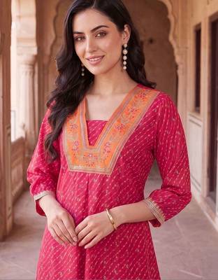 Women Ethnic Motifs Printed Regular Kurta with Trousers 1