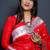 Red paithani silk blend saree with silver zari border