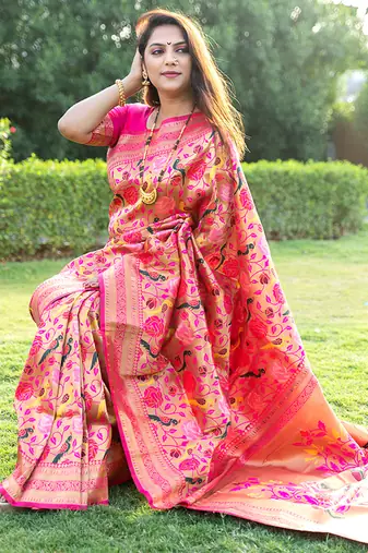 Rani pink paithani silk blend saree with gold zari & peacock meenakari motif