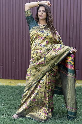 Beige and dark green paithani silk blend saree with peacock motif