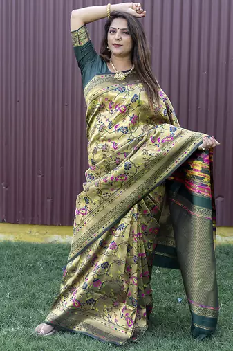 Beige and dark green paithani silk blend saree with peacock motif