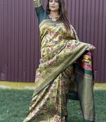 Beige and dark green paithani silk blend saree with peacock motif