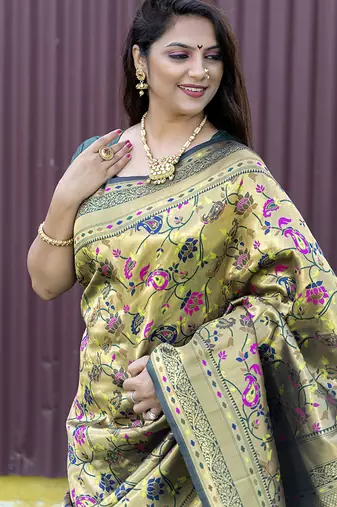 Beige and dark green paithani silk blend saree with peacock motif