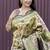 Beige and dark green paithani silk blend saree with peacock motif