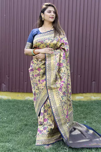 Beige and navy bkue paithani silk blend saree with peacock motif