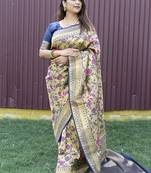 Beige and navy bkue paithani silk blend saree with peacock motif