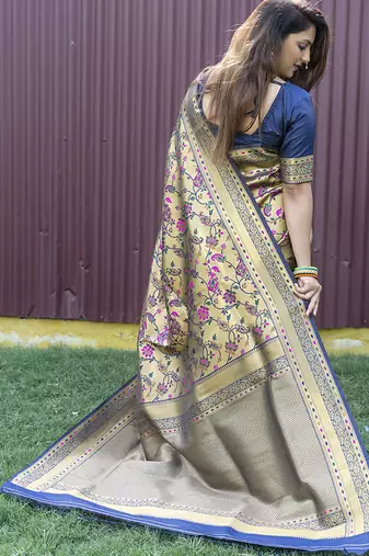 Beige and navy bkue paithani silk blend saree with peacock motif