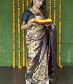 Beige and black paithani silk blend saree with peacock motif