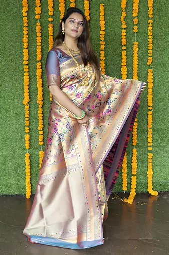 Beige and grey paithani silk blend saree with peacock motif