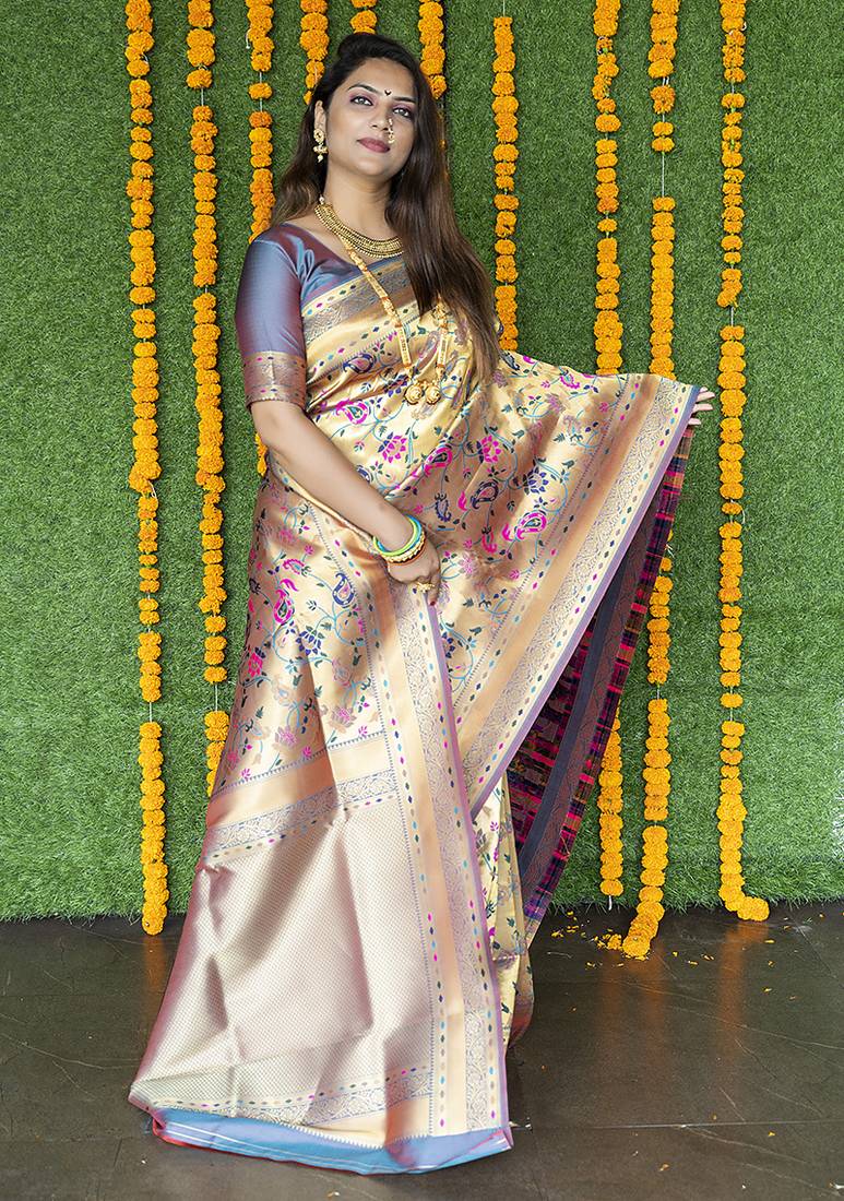Beige and grey paithani silk blend saree with peacock motif