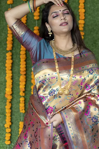 Beige and grey paithani silk blend saree with peacock motif