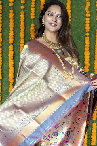 Beige and grey paithani silk blend saree with peacock motif