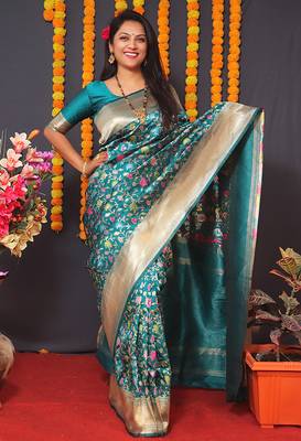 Teal blue banarasi silk blend saree with floral jaal & zari border 1