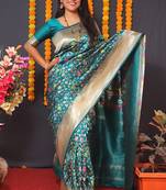 Teal blue banarasi silk blend saree with floral jaal & zari border