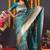 Teal blue banarasi silk blend saree with floral jaal & zari border