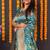 Teal blue banarasi silk blend saree with floral jaal & zari border