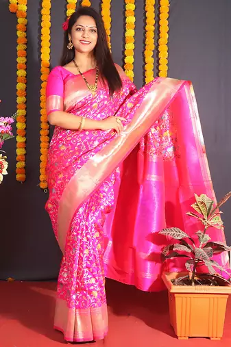 Rani pink banarasi silk blend saree with floral jaal & zari border