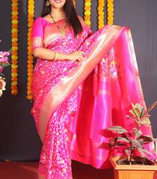 Rani pink banarasi silk blend saree with floral jaal & zari border