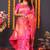 Rani pink banarasi silk blend saree with floral jaal & zari border