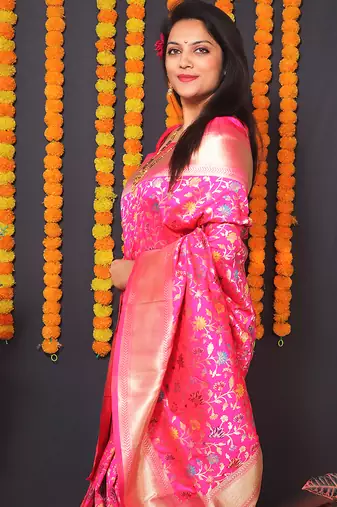 Rani pink banarasi silk blend saree with floral jaal & zari border