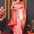 Light pink banarasi silk blend saree with floral jaal & zari border