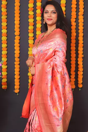 Light pink banarasi silk blend saree with floral jaal & zari border