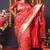 Red banarasi silk blend saree with floral jaal & zari border