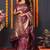 Wine banarasi silk blend saree with floral jaal & zari border