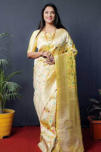 Lemon yellow banarasi silk blend saree with floral jaal & zari border
