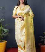 Lemon yellow banarasi silk blend saree with floral jaal & zari border