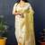 Lemon yellow banarasi silk blend saree with floral jaal & zari border
