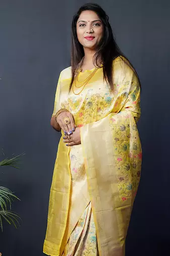 Lemon yellow banarasi silk blend saree with floral jaal & zari border