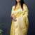 Lemon yellow banarasi silk blend saree with floral jaal & zari border
