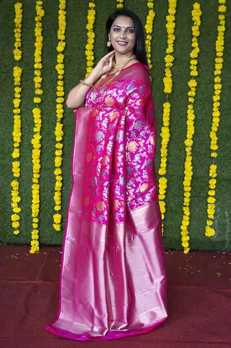 Rani pink silk blend banarasi zari woven saree with blouse