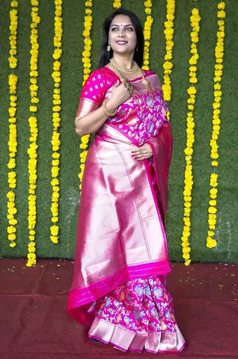 Rani pink silk blend banarasi zari woven saree with blouse