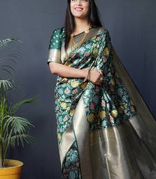 Dark green silk blend banarasi zari woven saree with blouse