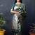 Dark green silk blend banarasi zari woven saree with blouse
