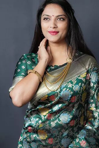 Dark green silk blend banarasi zari woven saree with blouse