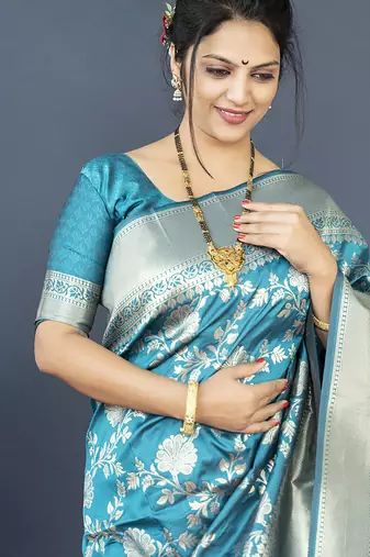 Aqua blue banarasi silk blend saree with floral zari weaving