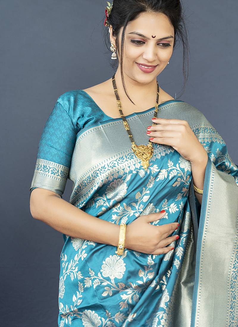 Aqua blue banarasi silk blend saree with floral zari weaving