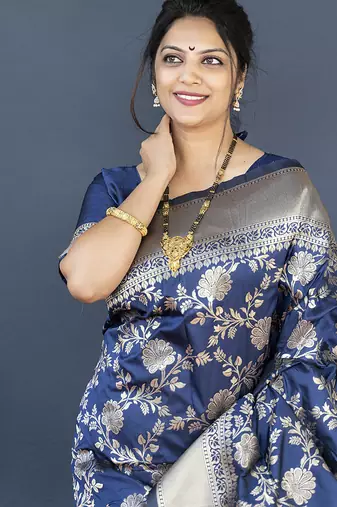 Navy blue banarasi silk blend saree with floral zari weaving
