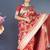 Red banarasi silk blend saree with floral zari weaving