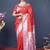 Red silk blend saree with silver zari booti & traditional floral pallu