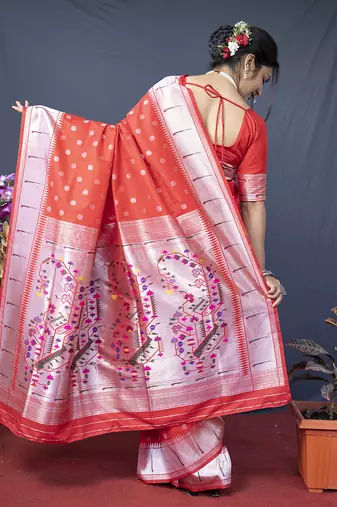 Red silk blend saree with silver zari booti & traditional floral pallu